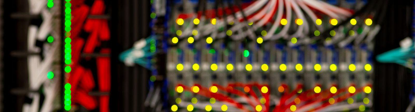 Computer server colorful wires and lights in a lab